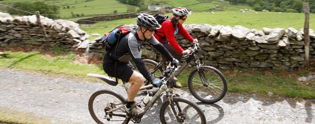 Couple Bicycling